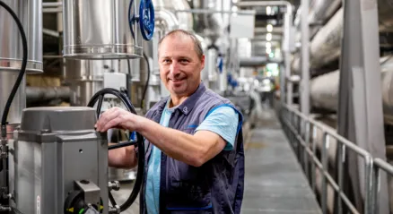 A man in workwear in a technical area